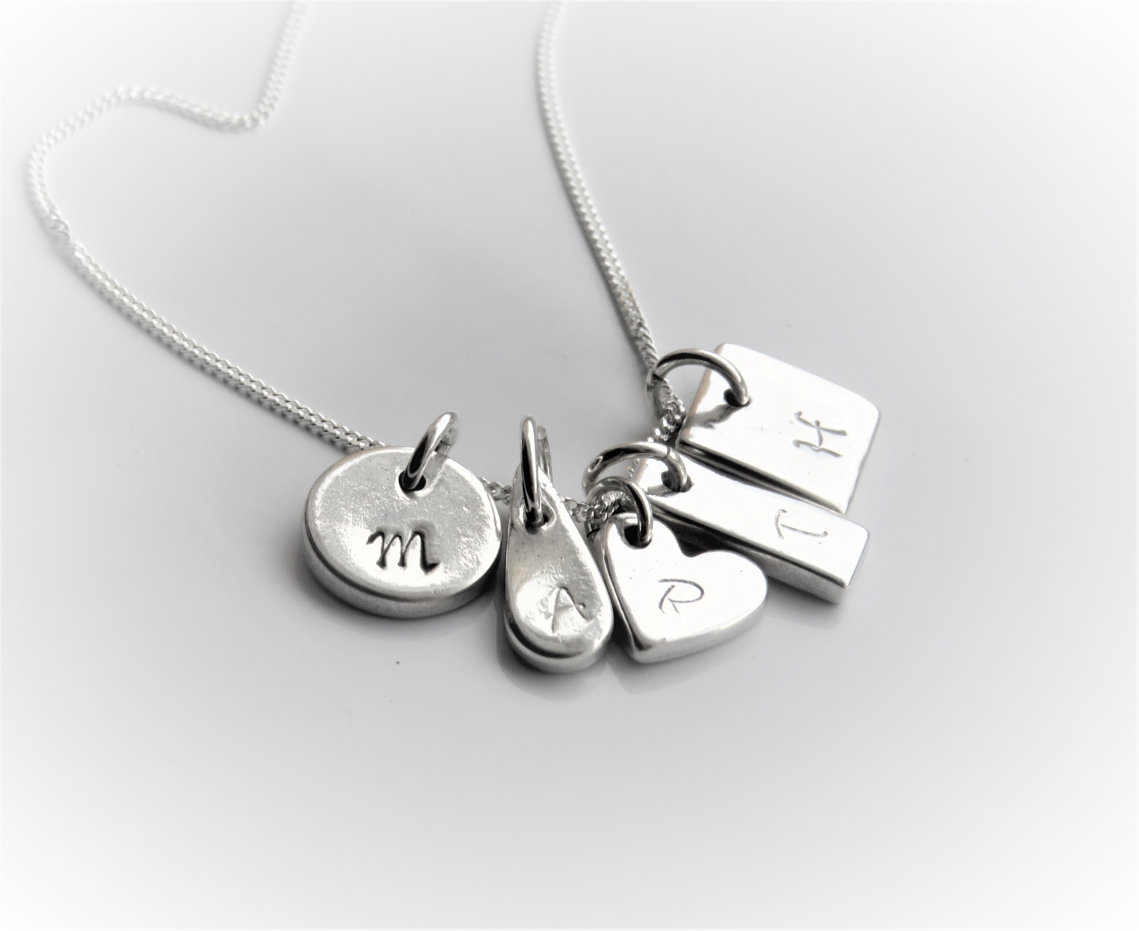 Initial Charms