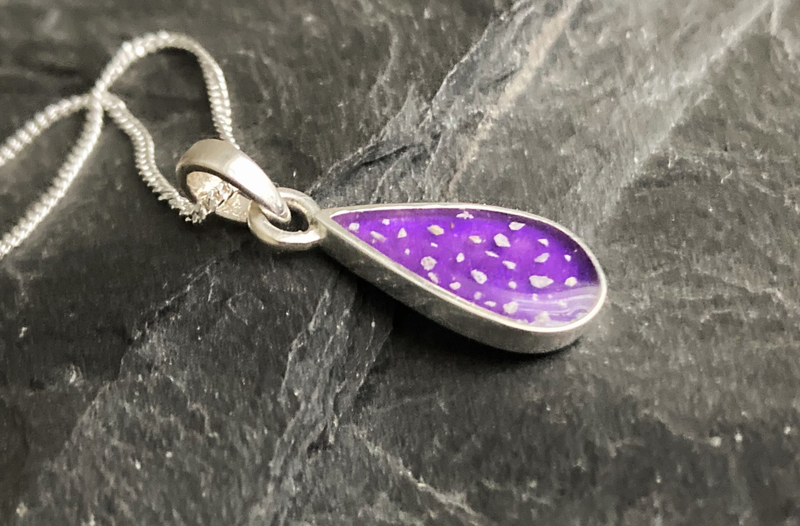 Purple sterling silver tear drop ashes in resin pendant Purple sterling silver tear drop ashes in resin pendant