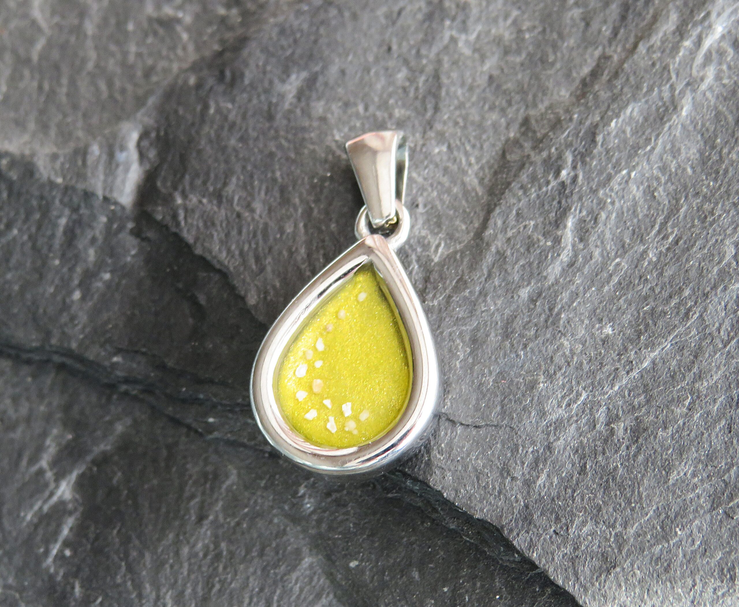 IMG_876stainless steel mini tear drop ashes in resin pendant with yellow resin0 stainless steel mini tear drop ashes in resin pendant with yellow resin